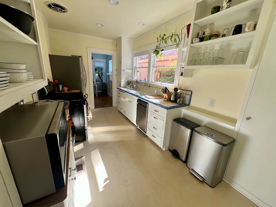 Updated kitchen has a dishwasher, in-sink disposal, and gas range/oven. Refrigerator has also recently been updated and now dispenses water along with 3 different kinds of ice! Much like the rest of the house, the kitchen has a ton a natural light.