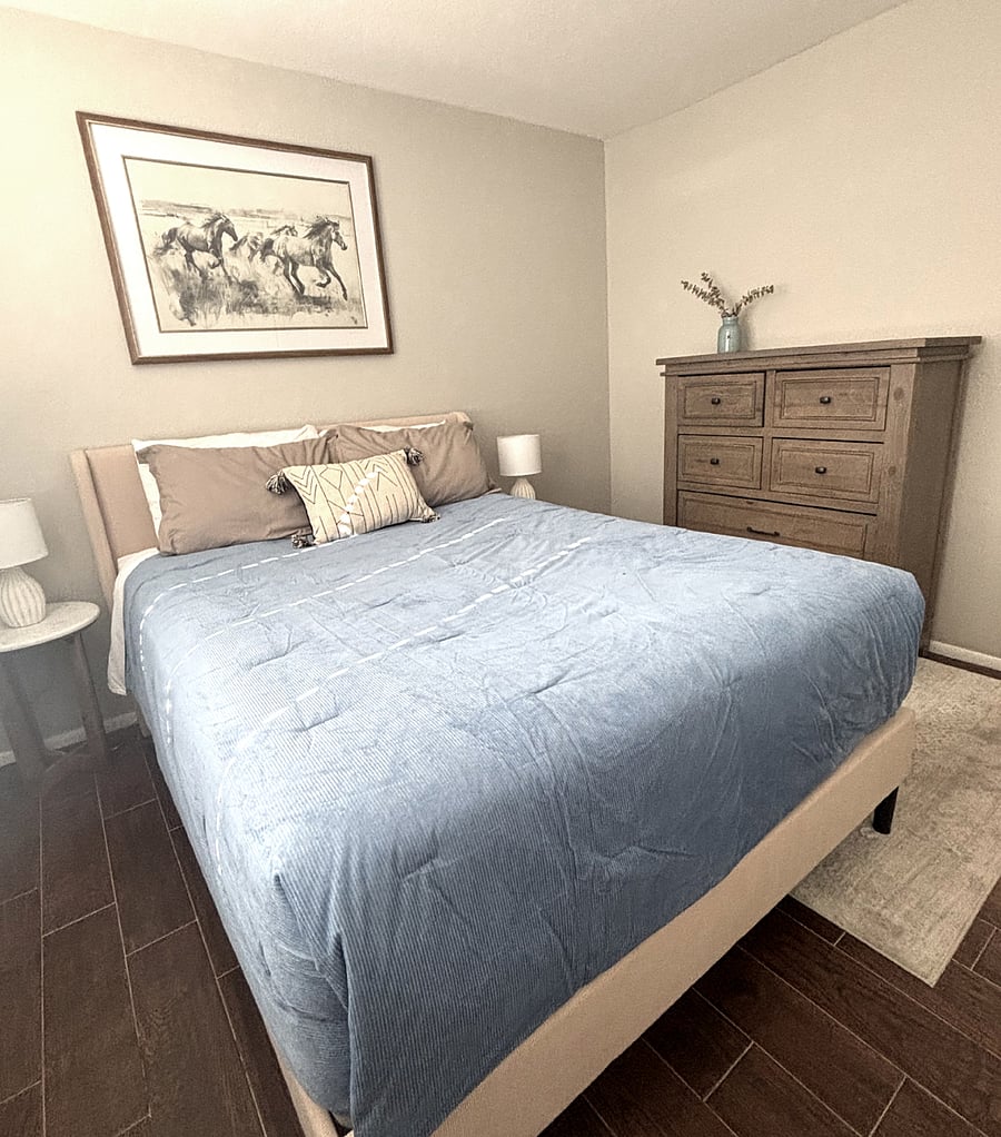 Bedroom 2 with Queen bed, nightstands, dresser and closet