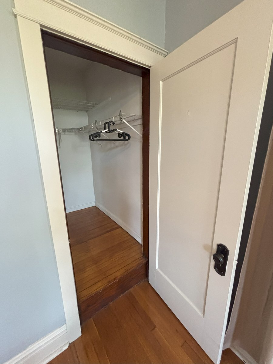 Main bedroom includes a spacious walk-in closet
