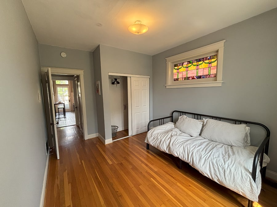 Second bedroom features another spacious closet and a day bed that can be a lounge spot or fold out to a full size bed.