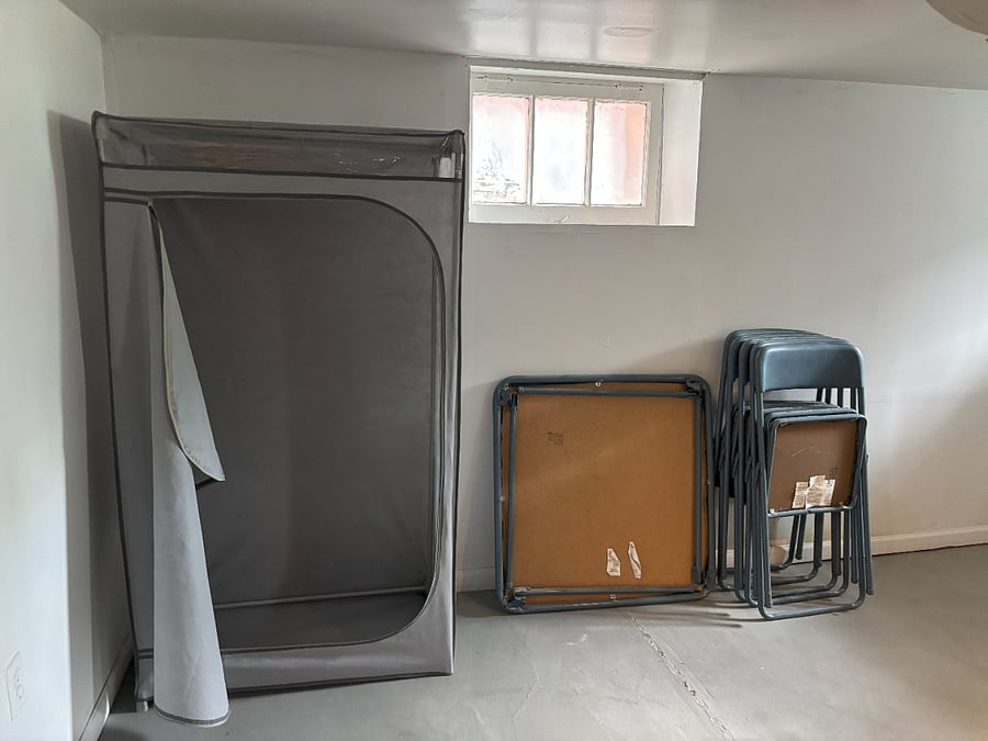 If the spacious closets don't fit your needs, there is extra clothing storage in the basement.