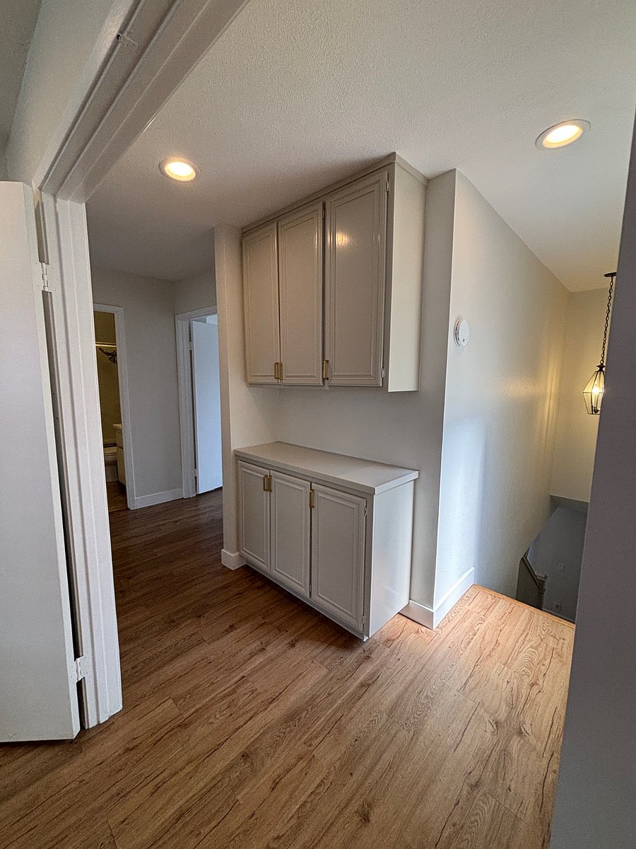 From den/office: Linen cabinet, upstairs hall