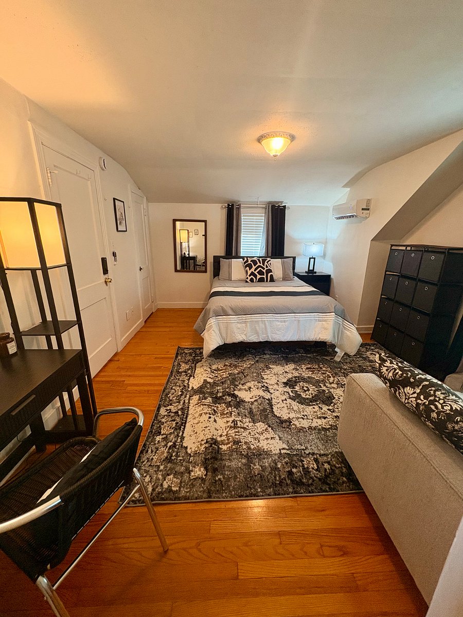 Bedroom #3 - queen bed, multiple closets, mini-split for personalized heating and cooling, desk, loveseat and cozy dormer area for reading and dreaming