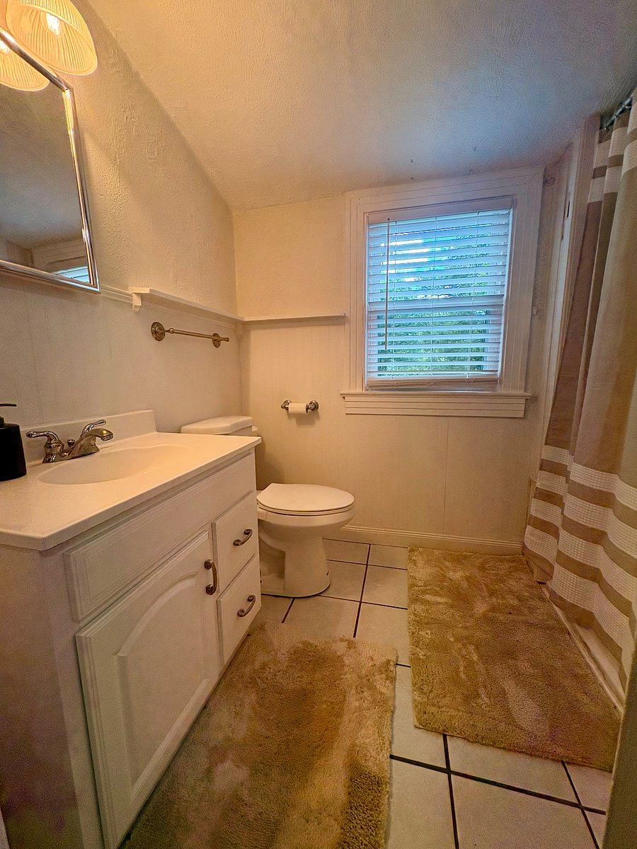Full bathroom upstairs between bedroom #2 and bedroom #3