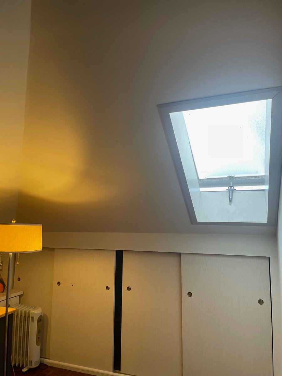 Skylight in the bedroom. This is a very quiet block so I keep it open unless it's raining.