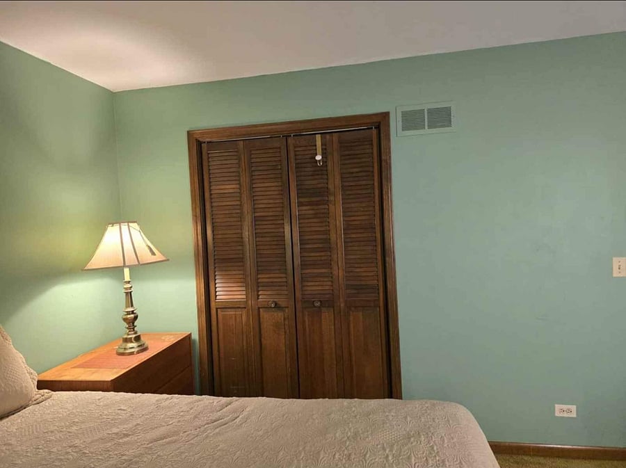 Spacious wooden closet, perfect for extended stays.