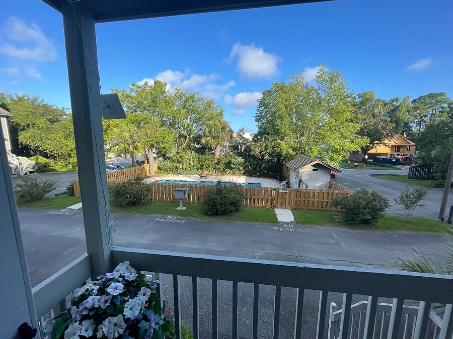 View of Pool and additional parking from front porch