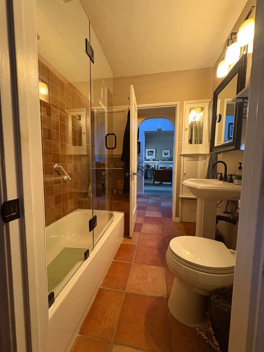 Larger bathroom from adjacent bedroom