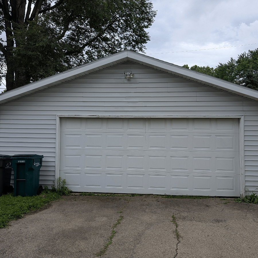 Space is fenced from right side of garage to the back left corner of house.
