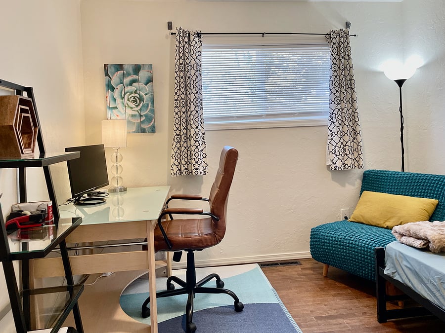 Flex room with workstation and twin XL bed.