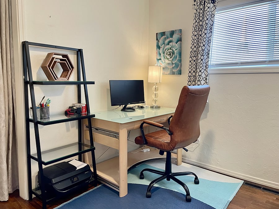Flex room with workstation and twin XL bed.