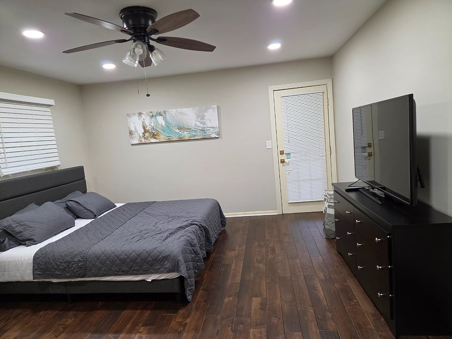 Master bedroom with TV