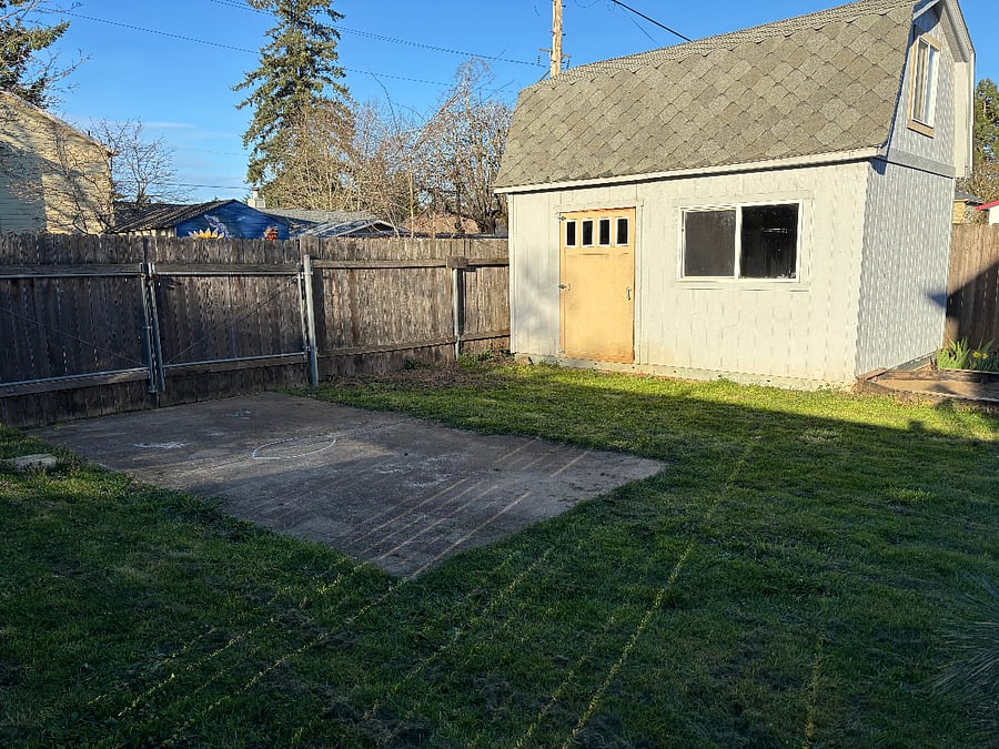 Extra storage available in the shed. Free street parking is available, with an optional dedicated space accessed through a locked gate off the alley.