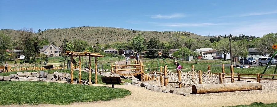 Large park with covered picnic area, BBQ and playground.