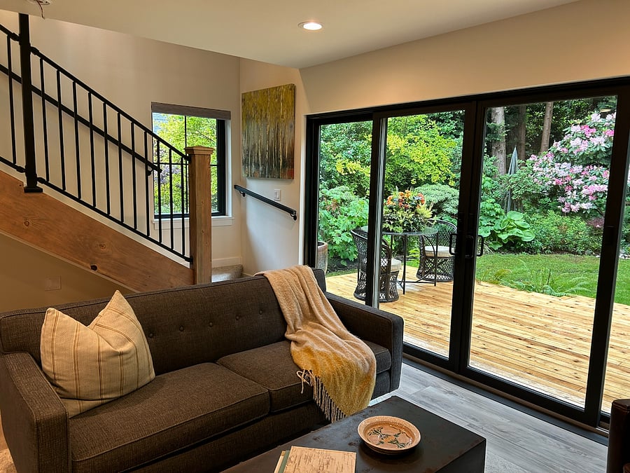 Living Room, Deck, and Stairs to Master Bedroom