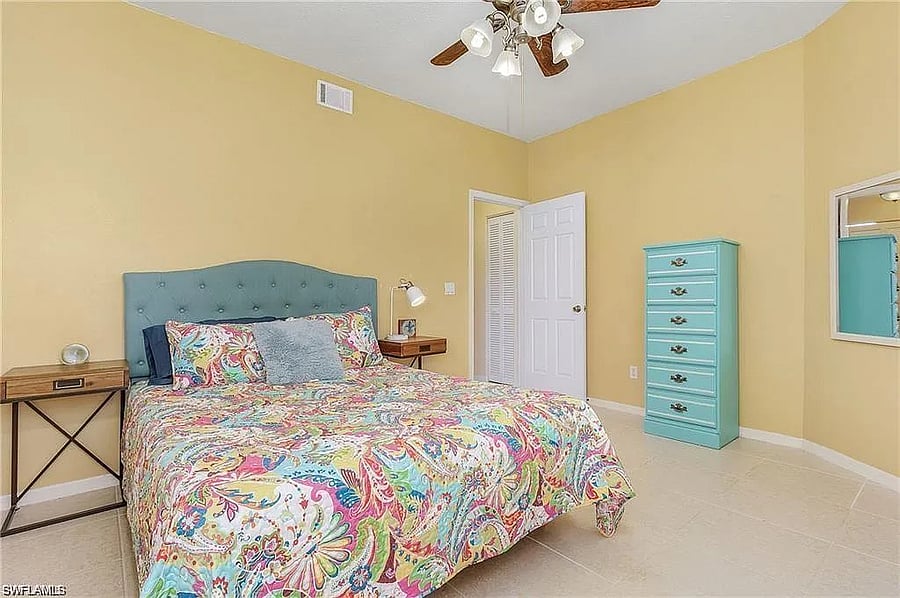 Bedroom with "Florida Vibes" and tile floor for easy cleaning and great for tenants with allergies.