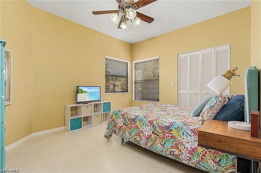 PLEASE NOTE: TV was photoshopped in by photographer for Zillow listing. There is no TV in this bedroom.