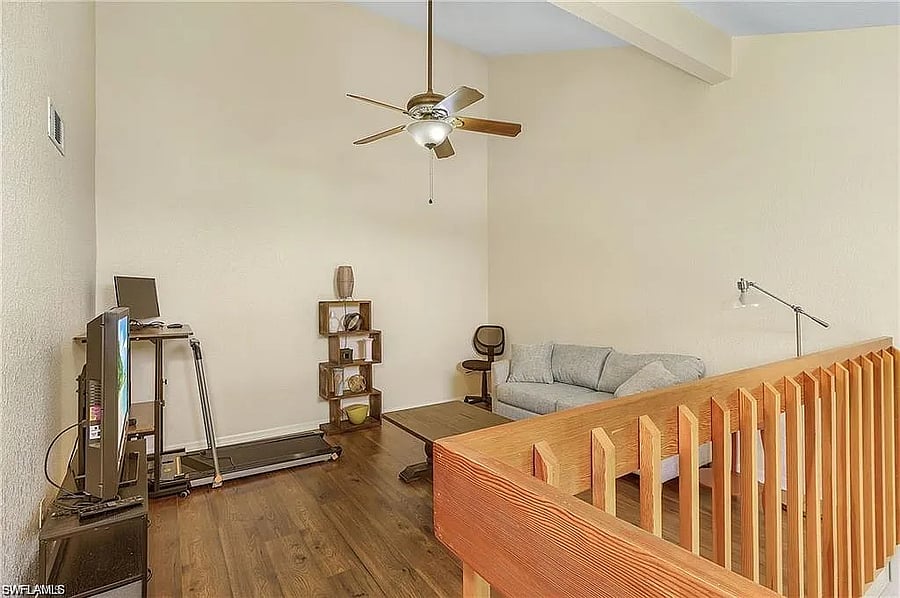 Spacious loft. Note the treadmill and desk/monitors were removed by owner. Was used as a home office. Couch has a comfortable pullout bed.