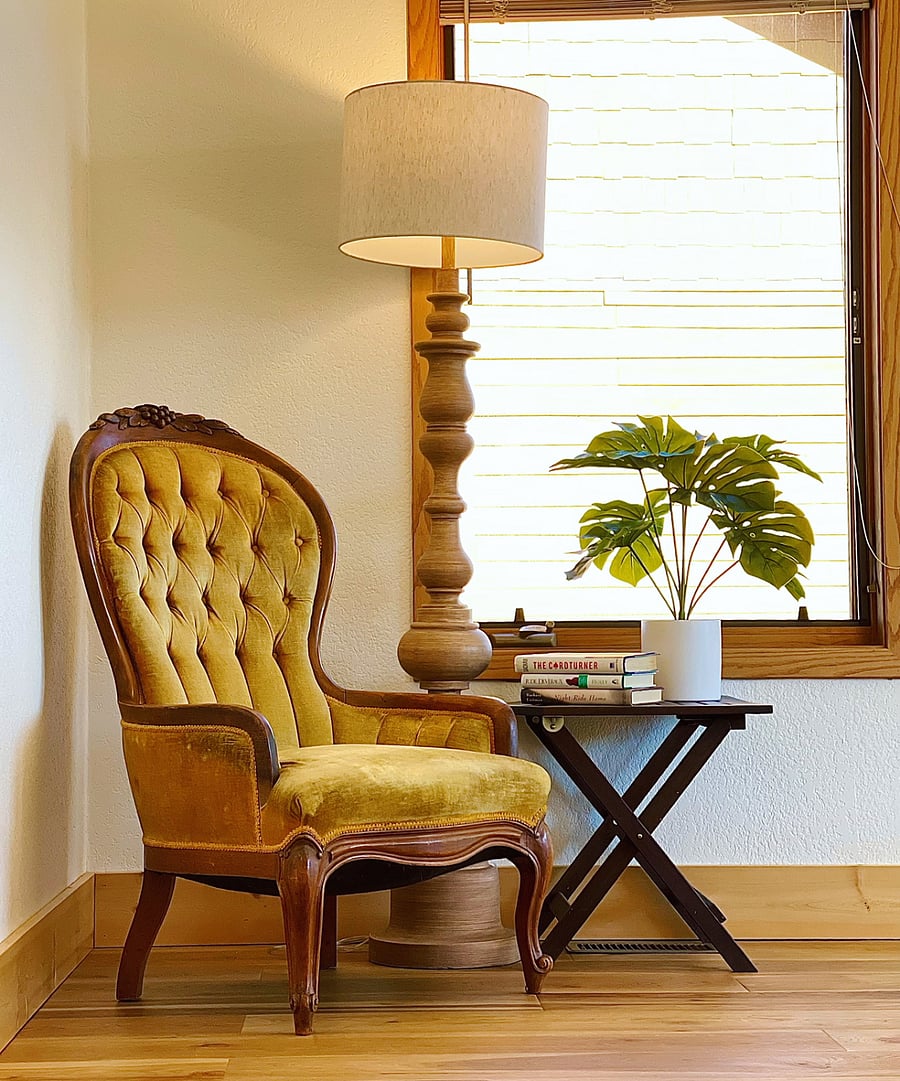 The upstairs living room features a cozy reading corner.