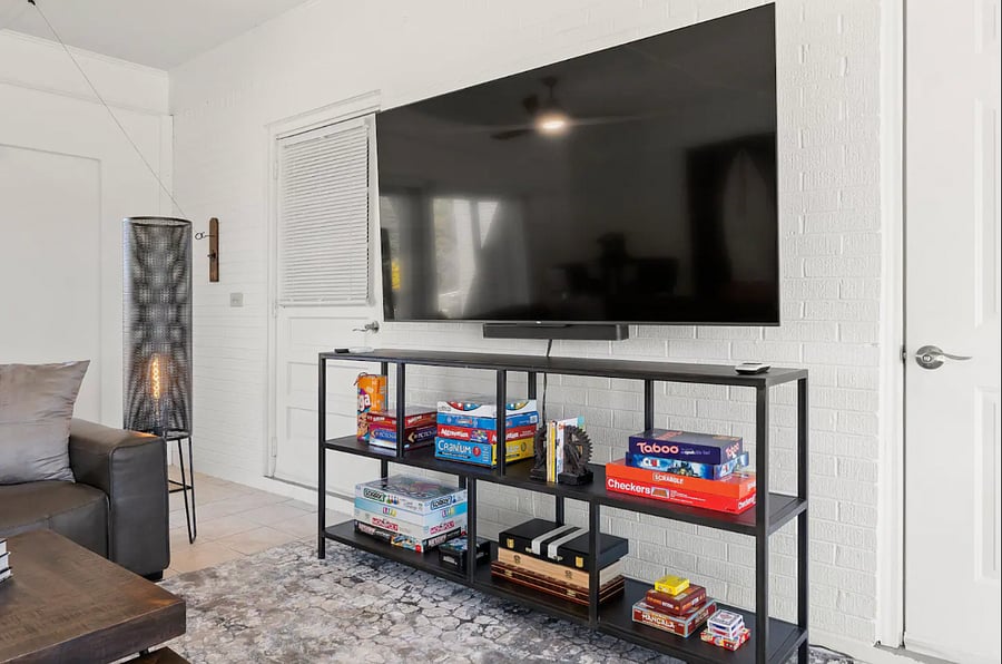 75" TV in shared family room. Games.