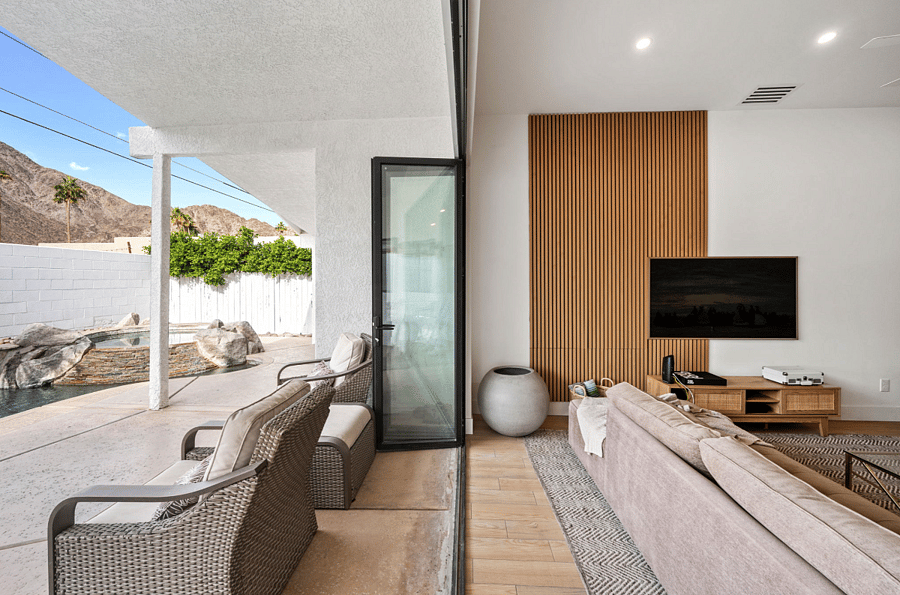 12' sliding door opens from living room to backyard with swimming pool