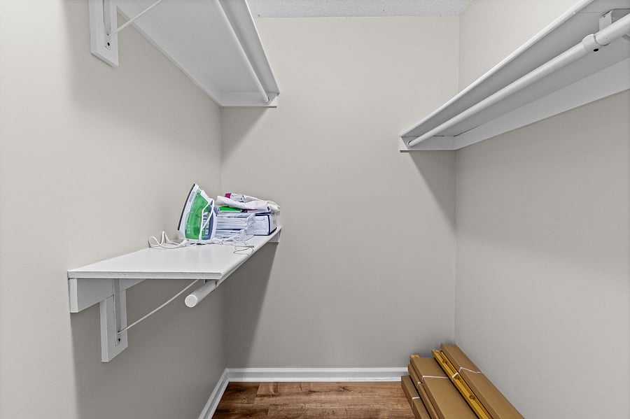 Primary bedroom offers huge closet for plenty of storage or to house a pet crate.