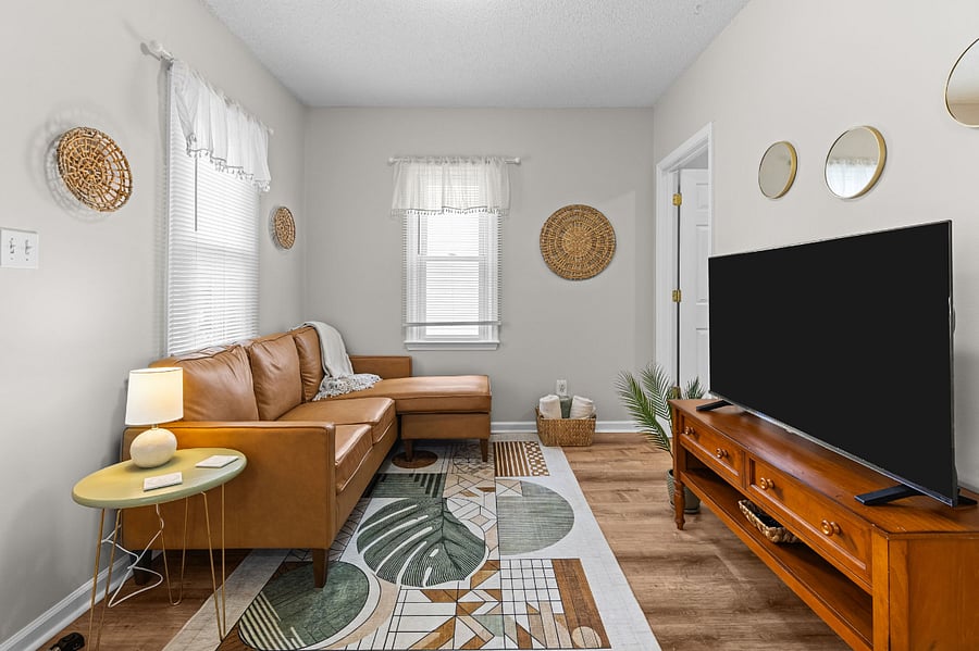 Living room with new 50" smart TV with all streaming apps
