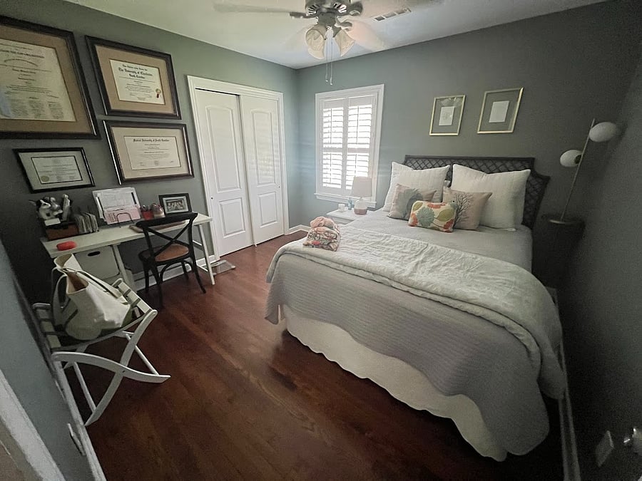Queen bedroom with workspace