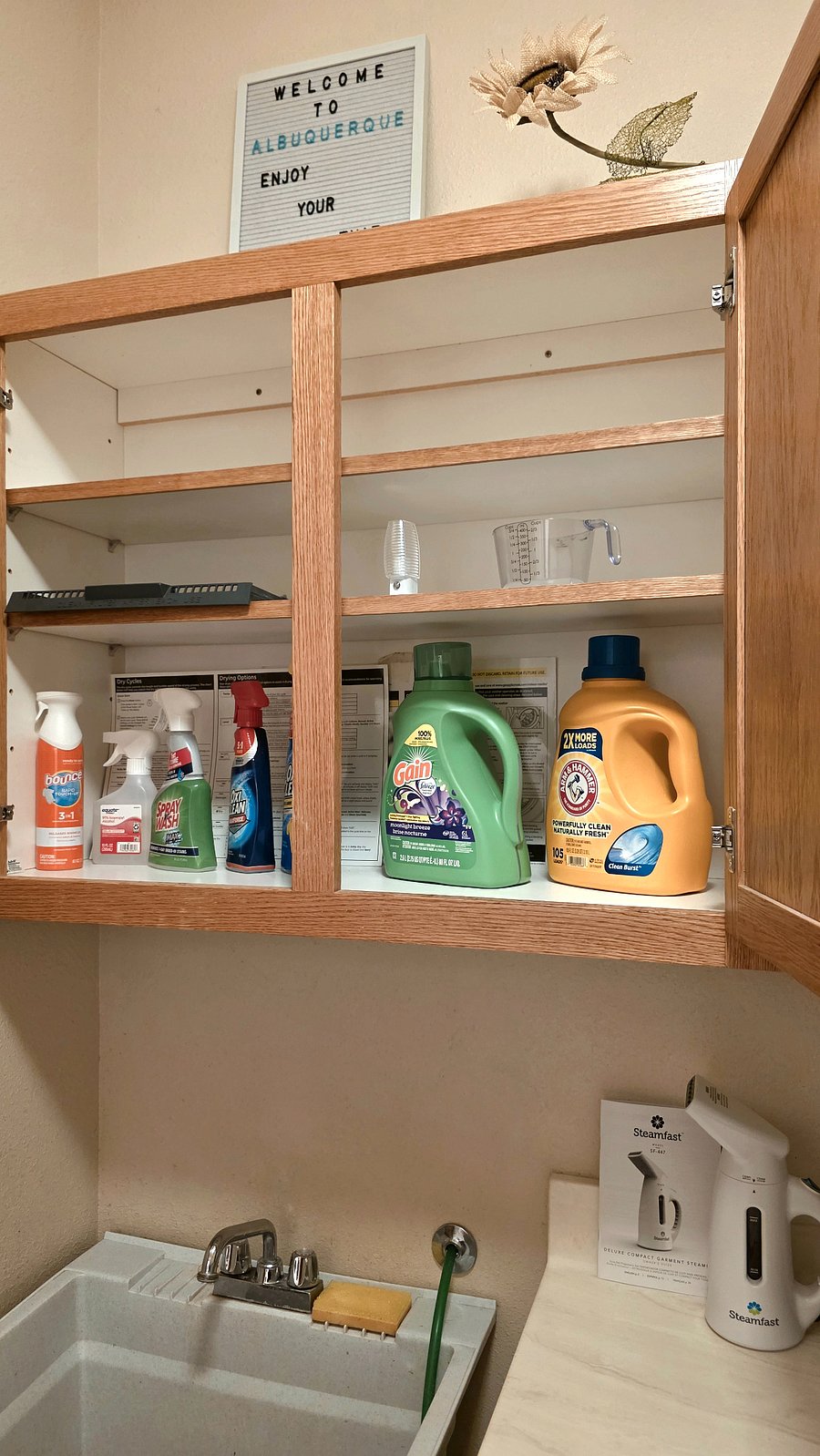 Starter of laundry detergent for every guest. Vertical steamer, In wall Ironing board, Iron.