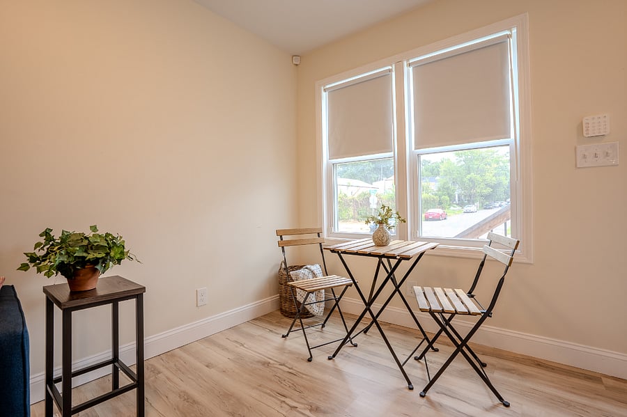 First floor living area with Smart TV, Sofa and arm chair, Coffee station that can be conveniently switched to working space.