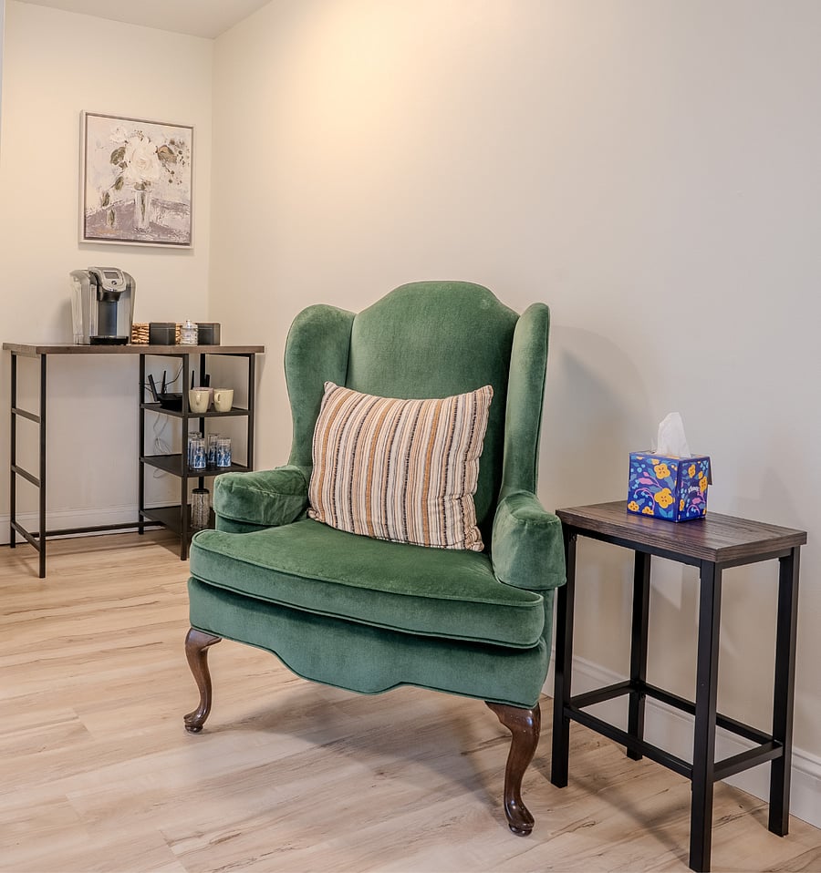 First floor living area with Smart TV, Sofa and arm chair, Coffee station that can be conveniently switched to working space.