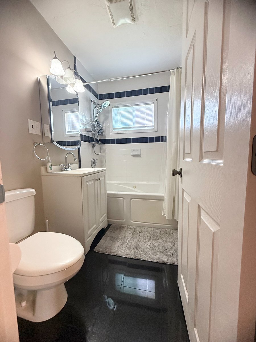 Bathroom with a shower, bathtub/jacuzzi.