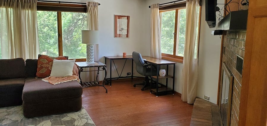 Office area next to huge L shaped couch