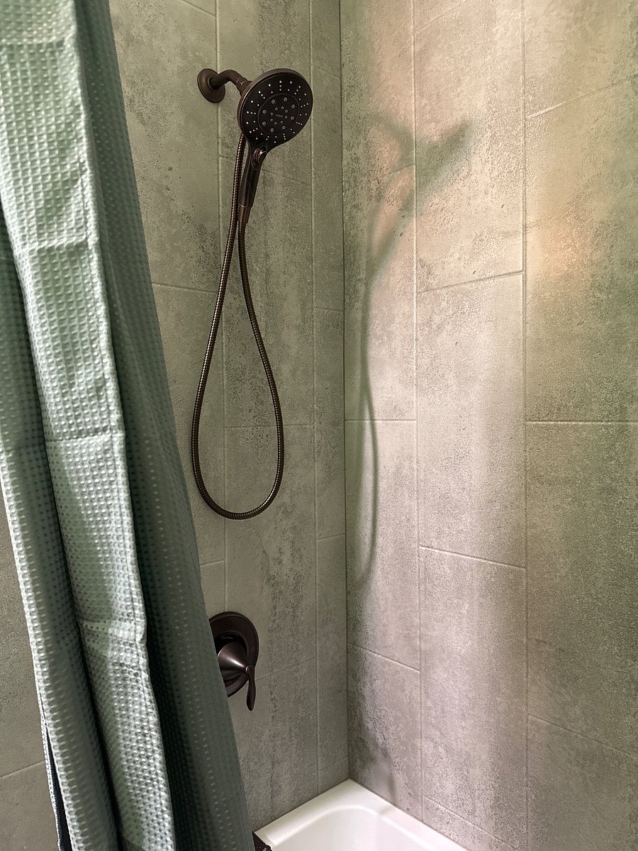 Brand new shower and tub