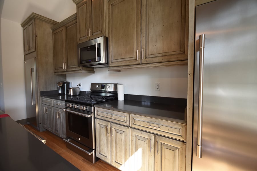 Kitchen from a different angle.  There is one full refrigerator on the right, and one full freezer on the left.