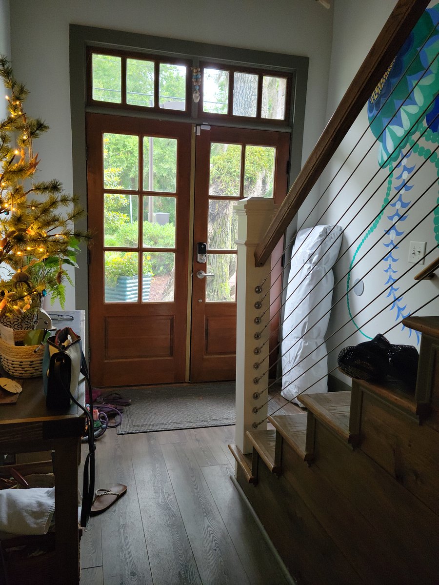 Front entryway. It doesn't normally have a carpet rolled up in the corner!
