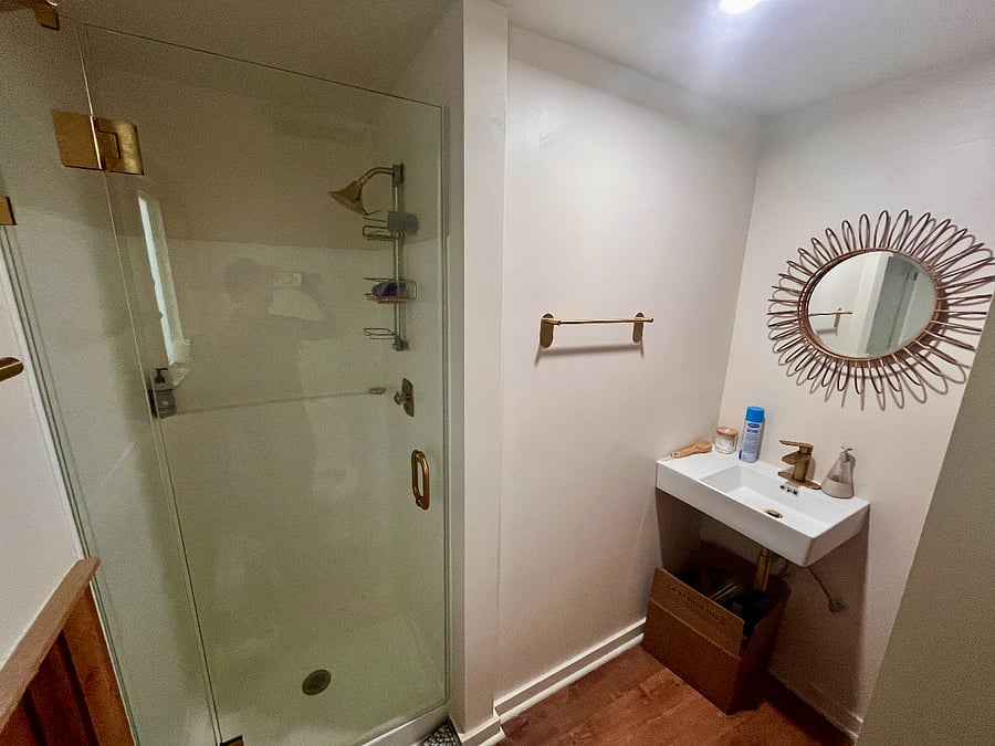 Downstairs full bathroom with shower