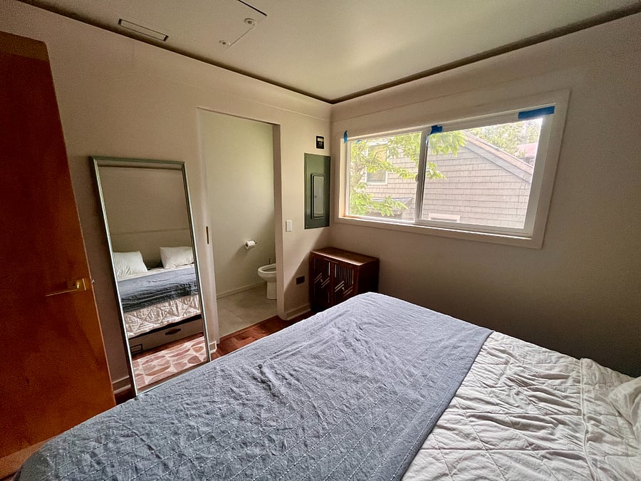 King bedroom with half bath