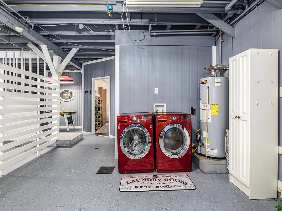 Washer and dryer on ground level next to the garage, game room and King suite