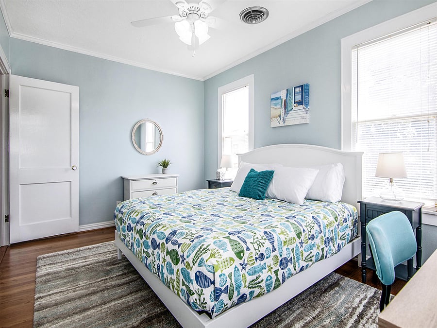 Upstairs king bedroom with smart TV and desk