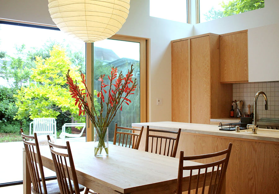 Large sliding doors offer seamless indoor / outdoor living