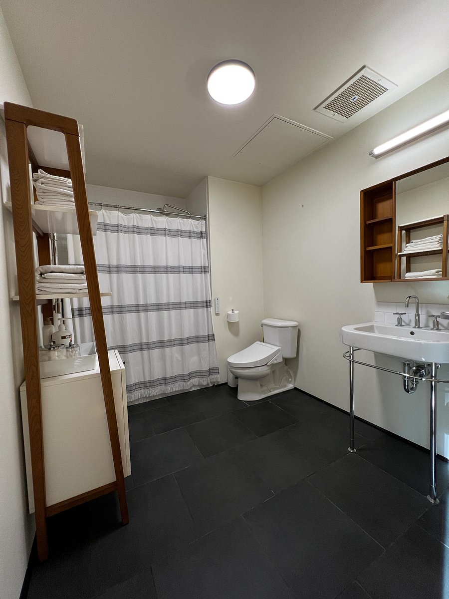 Both toilets have a Toto washlet.