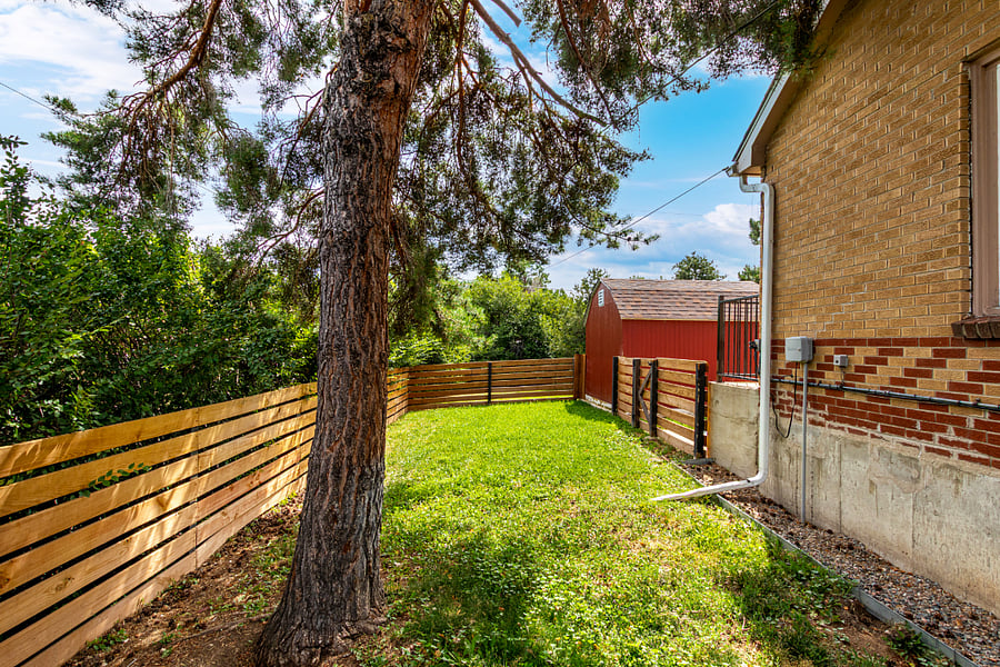 Fenced Yard for Pets. A small, secure section of the yard with mature shade tree for your pup to enjoy some fresh Colorado air in a safe, private space.