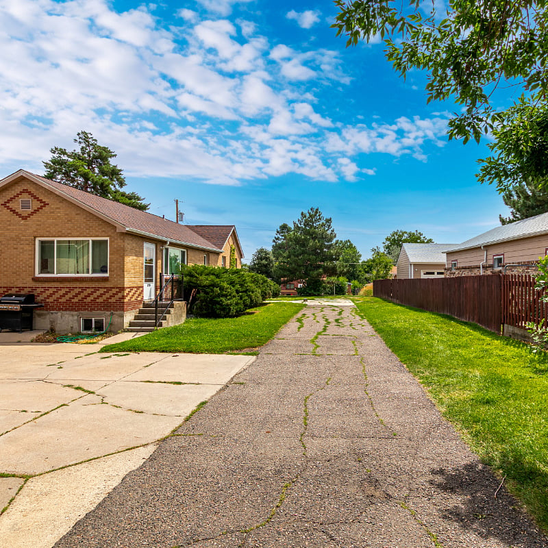 Long Driveway- set back from the street, this extended driveway offers, quiet, added privacy, and a safe, convenient place to park right next to the unit. 