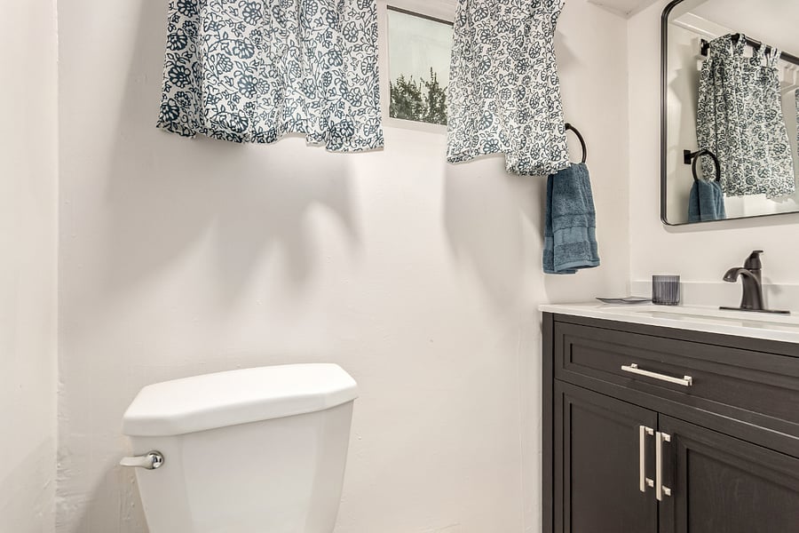 Updated vanity and fixtures. Modern bathroom features a sleek new vanity, contemporary mirror, and upgraded faucet. Clean, functional, and thoughtfully styled for your stay. 