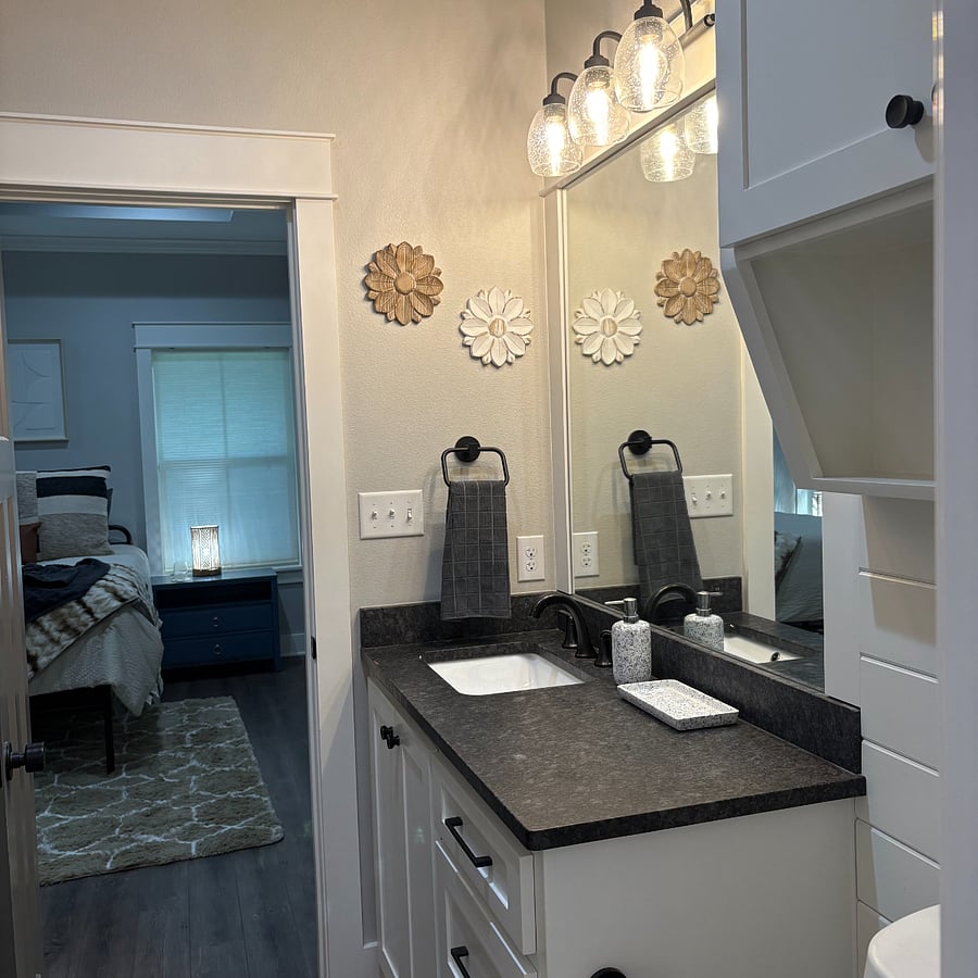 Master bath with poured stone counter.