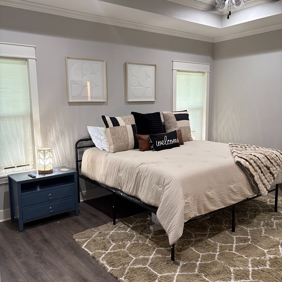 King size bed with plush mattress and boho vibe.