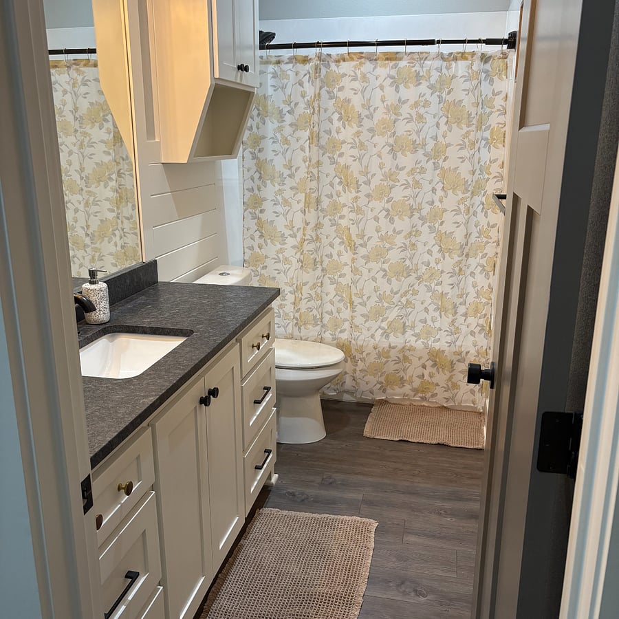Extra bath with shower and tub.