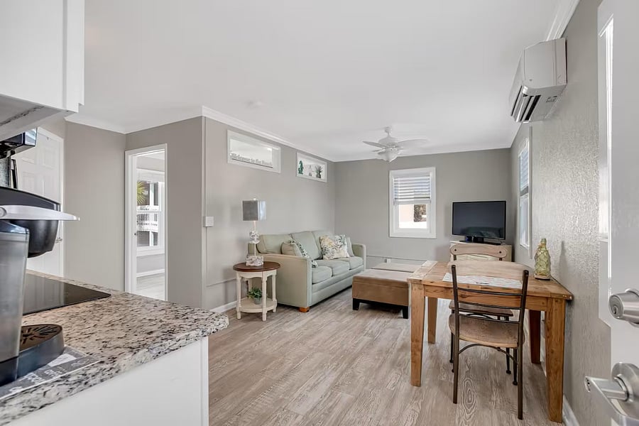 The kitchen table can also be used as a convenient workspace.