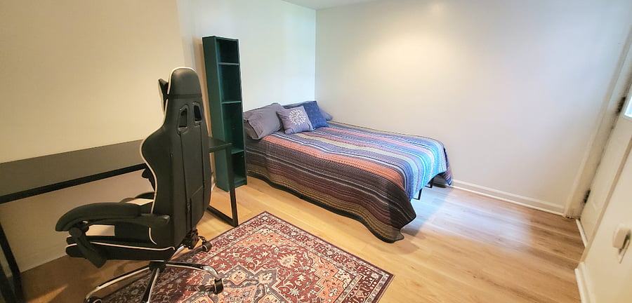 Room that is used as either the second bedroom or as a study/den (bed can be removed if desired).